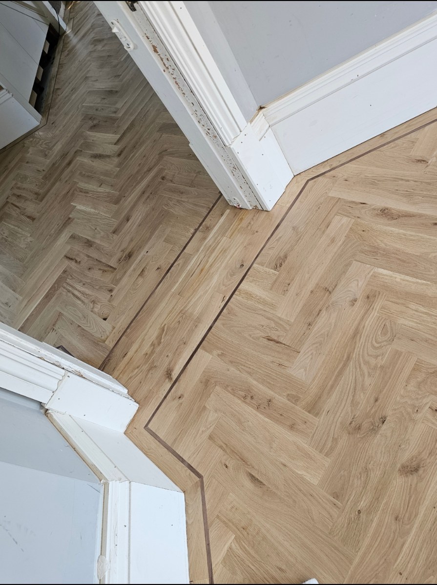 Herringbone flooring installation photo 2